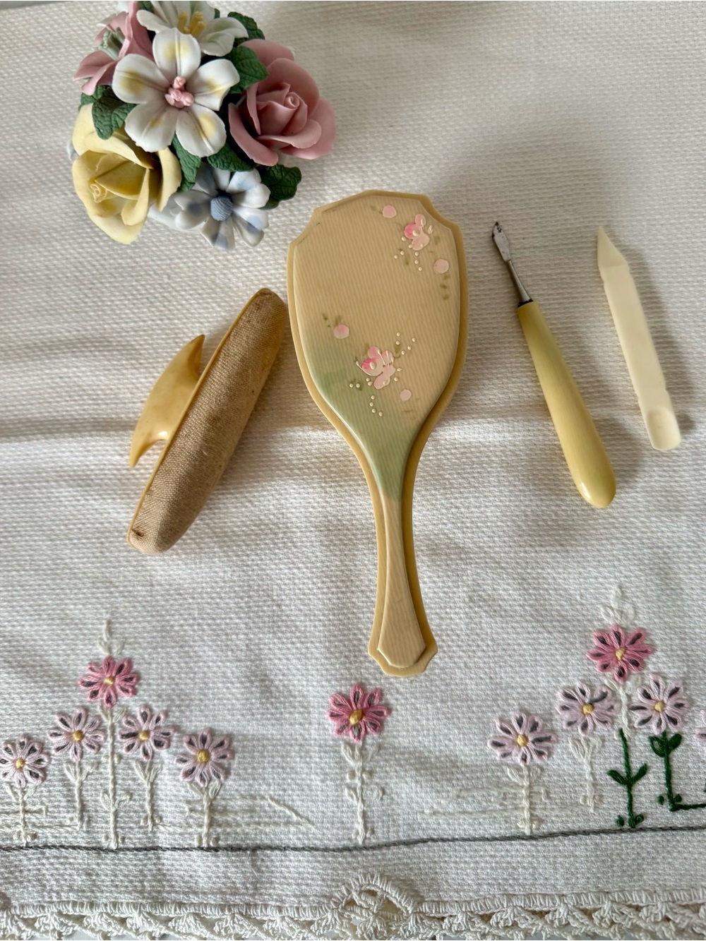 Celluloid child's hairbrush hand-painted floral design, circa 1920s-1930s